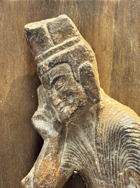 A Chinese sandstone 'Bai Ma Shi Zu 白馬舐足' carving, Northern Wei