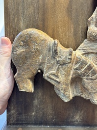 A Chinese sandstone 'Bai Ma Shi Zu 白馬舐足' carving, Northern Wei