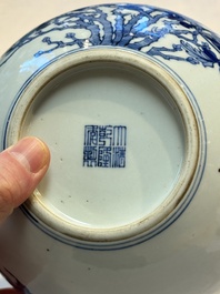 A Chinese blue, white and famille rose 'Peonies' vase, Qianlong mark, 20th C.