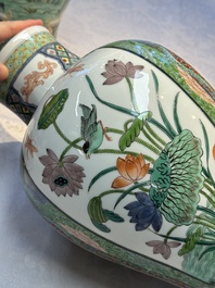 A pair of famille verte-style 'Lotus Pond and Flower Basket' vases and covers, Samson, Paris, 19th C.