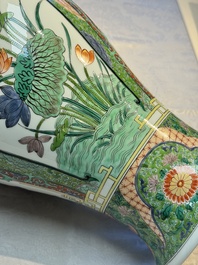 A pair of famille verte-style 'Lotus Pond and Flower Basket' vases and covers, Samson, Paris, 19th C.