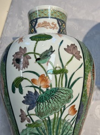 A pair of famille verte-style 'Lotus Pond and Flower Basket' vases and covers, Samson, Paris, 19th C.