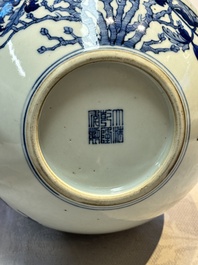 A Chinese blue, white and famille rose 'Peonies' vase, Qianlong mark, 20th C.
