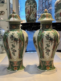 A pair of famille verte-style 'Lotus Pond and Flower Basket' vases and covers, Samson, Paris, 19th C.