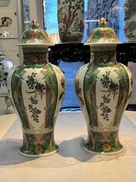 A pair of famille verte-style 'Lotus Pond and Flower Basket' vases and covers, Samson, Paris, 19th C.
