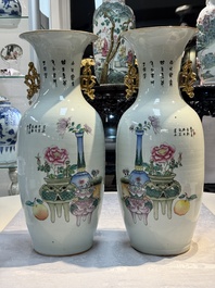 A pair of Chinese famille rose 'Chui Xiao Yin Feng 吹簫引鳳' vases, signed Pan Zhaotang 潘肇唐, dated 1923