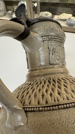 A Siegburg stoneware jug with mounted pewter lid, dated 1594