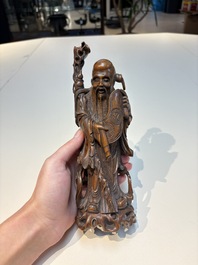 Six Chinese wooden and bamboo carvings, 19/20th C.