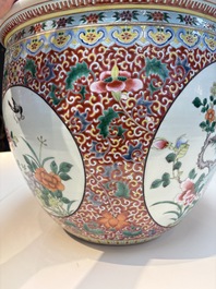A large Chinese famille rose 'Bird among Flowering Branches' scroll pot, 19th C.