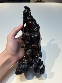 Six Chinese wooden and bamboo carvings, 19/20th C.