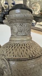 A Siegburg stoneware jug with mounted pewter lid, dated 1594