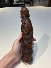 Six Chinese wooden and bamboo carvings, 19/20th C.