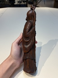 Six Chinese wooden and bamboo carvings, 19/20th C.