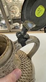 A Siegburg stoneware jug with mounted pewter lid, dated 1594