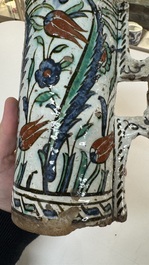 A polychrome Iznik mug, late 16th C.