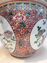 A large Chinese famille rose 'Bird among Flowering Branches' scroll pot, 19th C.