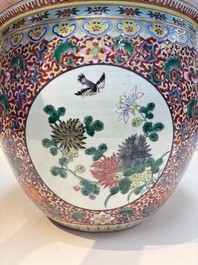 A large Chinese famille rose 'Bird among Flowering Branches' scroll pot, 19th C.