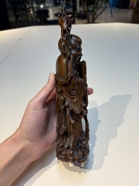 Six Chinese wooden and bamboo carvings, 19/20th C.