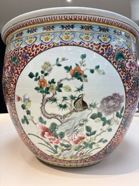 A large Chinese famille rose 'Bird among Flowering Branches' scroll pot, 19th C.