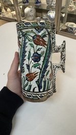 A polychrome Iznik mug, late 16th C.