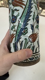 A polychrome Iznik mug, late 16th C.