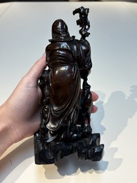 Six Chinese wooden and bamboo carvings, 19/20th C.
