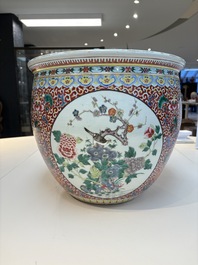 A large Chinese famille rose 'Bird among Flowering Branches' scroll pot, 19th C.