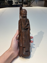 Six Chinese wooden and bamboo carvings, 19/20th C.