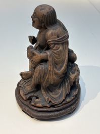 Six Chinese wooden and bamboo carvings, 19/20th C.