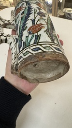 A polychrome Iznik mug, late 16th C.