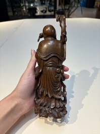 Six Chinese wooden and bamboo carvings, 19/20th C.