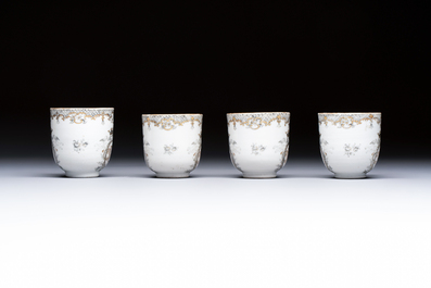 Four sets of Chinese export grisaille and gilt-decorated handled cups and saucers with crowned monograms, Qianlong
