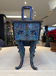 A pair of Chinese cloisonn&eacute; 'Fangding' censers and covers with Taotie design on carved wooden stands, 19th C.