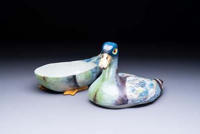 A polychrome French faience duck-form tureen and cover, possibly Bordeaux, 18th C.