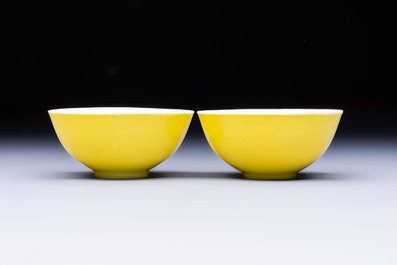 A pair of fine Chinese lemon-yellow-glazed tea bowls, Yongzheng mark, 19th C.