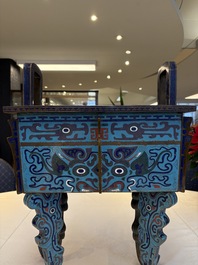 A pair of Chinese cloisonn&eacute; 'Fangding' censers and covers with Taotie design on carved wooden stands, 19th C.