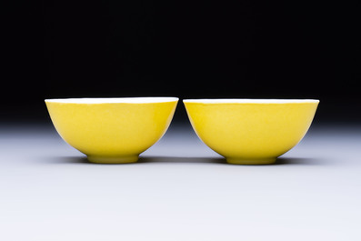A pair of fine Chinese lemon-yellow-glazed tea bowls, Yongzheng mark, 19th C.