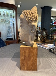 A Thai pottery Haripunjaya-style head of Buddha, possibly 13th C.