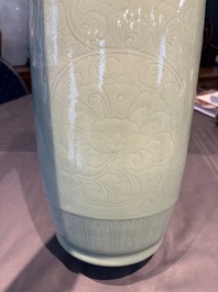 A Chinese celadon-glazed rouleau vase with incised floral design, 18th C.