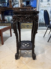 Two finely carved Chinese marble-topped hongmu stands, 19th C.