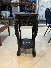 Two finely carved Chinese marble-topped hongmu stands, 19th C.