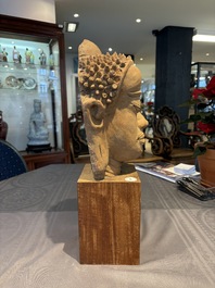 A Thai pottery Haripunjaya-style head of Buddha, possibly 13th C.