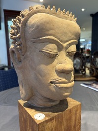 A Thai pottery Haripunjaya-style head of Buddha, possibly 13th C.
