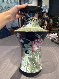 A Chinese famille rose blue-ground 'Lotus Pond' vase, Daoguang mark, 20th C.