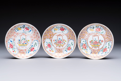 Six Chinese famille rose gilt-decorated 'Flower Basket' cups and saucers, Yongzheng/Qianlong