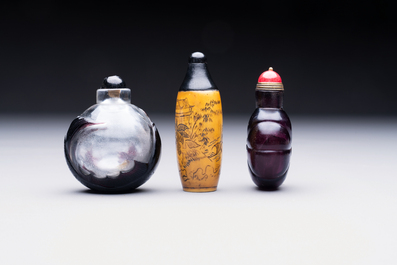 Two Chinese glass snuff bottles and a buffalo bone snuff bottle, Xianfeng mark, 19th C.