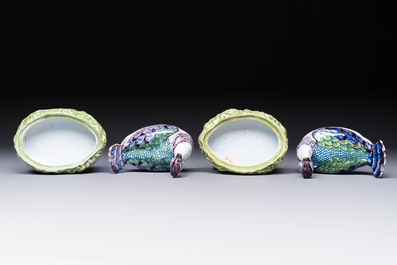 A pair of polychrome Dutch Delft 'Lapwings' tureens and covers, 18th C.