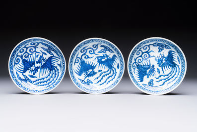 Five Chinese blue and white 'Phoenix' saucers, Wanli mark and of the period