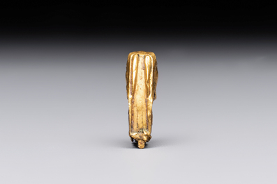 A rare Chinese turquoise- and glass-inlaid gold fitting in the form of a parrot, Han