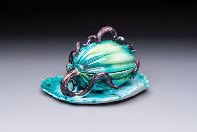 A very rare Brussels faience melon-shaped tureen and cover on stand, 18th C.